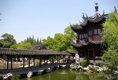 Enchanting ancient Yu Garden offers a respite from bustling metropolis. 