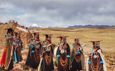 When Our Photography Tour Met the Burang Peacock Costume...