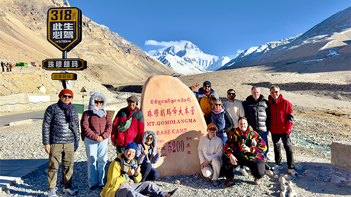 Group photo with Mount Everest