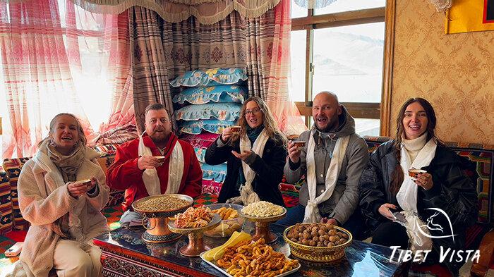 Our beloved guests taste Tibetan snacks