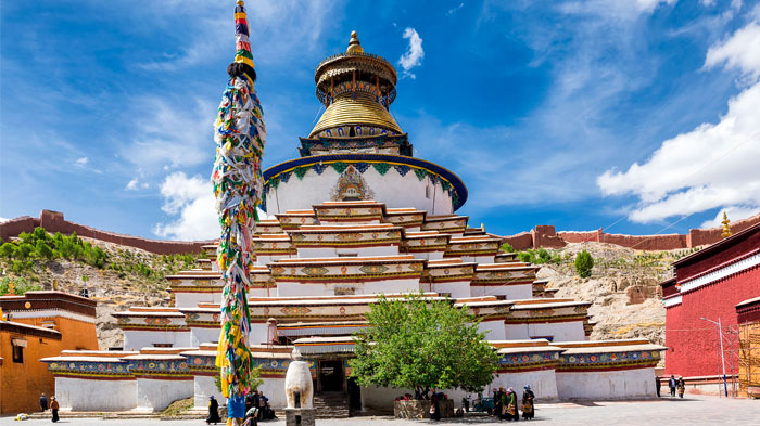 Multi-story Gyantse kumbum Stupa greets you in April in Gyantse