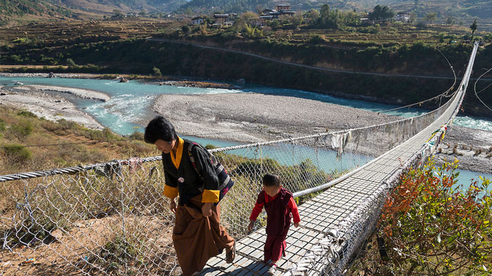 Crossing the suspension bridges of Bhutan