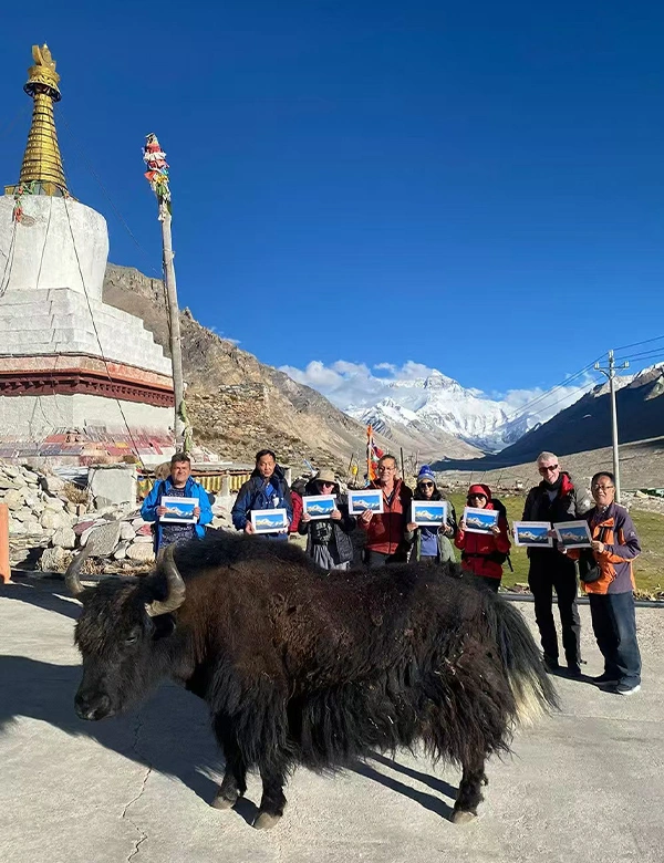 Travelers taking photos at Everest Base Camp