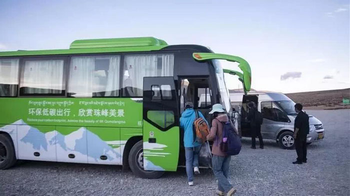 Travellers getting on the eco-bus