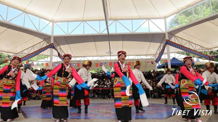 Local Tibetan people dancing in Zongjiao Lukang Park druing Saga Dawa Festival