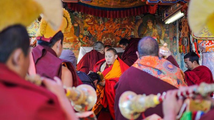 receiving blessings at Sera Monastery