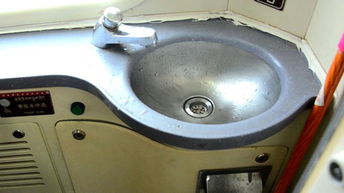 sink inside toilet