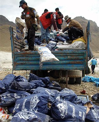 Chinese environmentalists are dropping the collected trash from Mt. Everest.