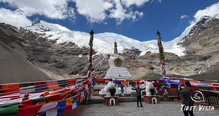 Pause for photo shots with imposing Karola Glacier