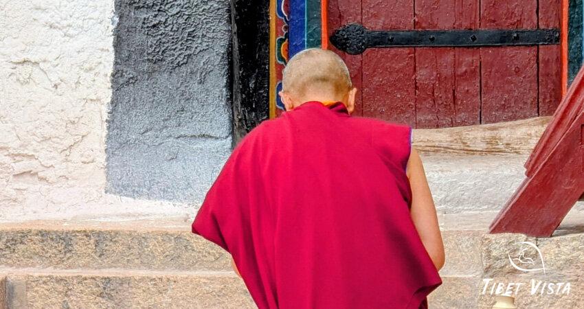 The Tibetan monks wearing an iconic red robe