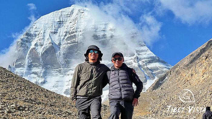 Our tour guide Sonam and Tenzin in front of Mount Kailash in Tibet