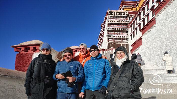 climbing the long steps of Potala Palace