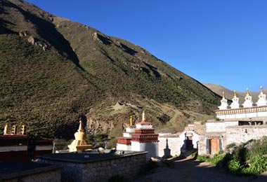 White stupas of Tsurphu Monastery