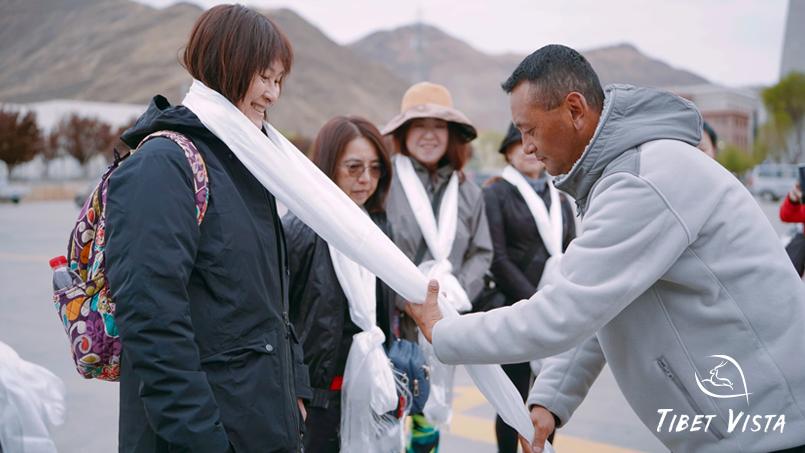 our guide greets our guiests at lhasa gonngar airport