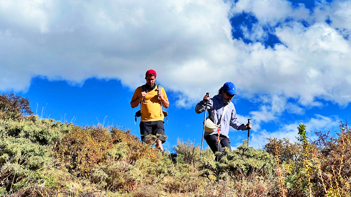 make their way to Namtso Lake using trekking poles