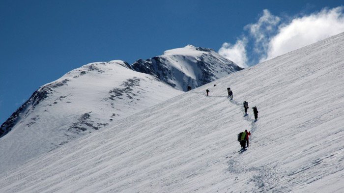 climbing snow mountain