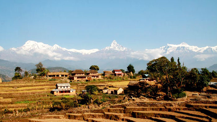 The peaceful village and snow-capped mountains in Nepal