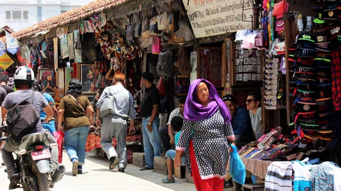 Souvenir shops reopen for the tourists.