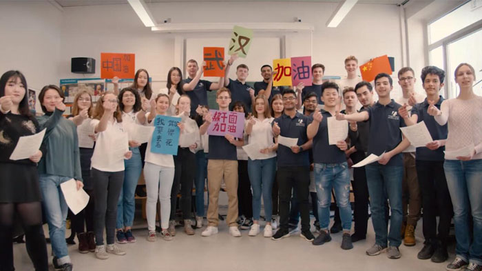 German students from Burg Gymnasium Essen sang songs to support Wuhan and China.