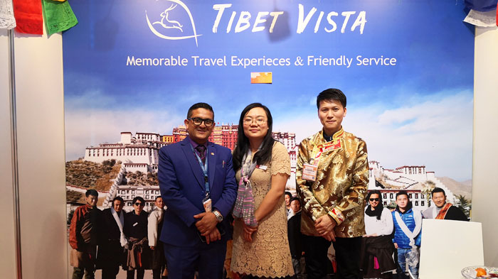  Mrs. Catherine Jigme and Mr. Yong Yang with Tour Agent from Other Country 