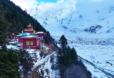 A serene temple nestled beneath the enchanting, snow-capped mountains of Bomi.