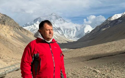 Traveler photo: Framed against Everest, the guest captures the proudest moment of their Tibet journey in a single shot. (April 2026)