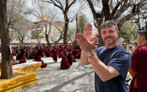Traveler photo: A guest watches monks debate for the first time, captivated by the monks' vivid expressions and sharp hand-claps. (April 2026)
