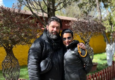 Traveler photo: Our guests laugh naturally in Norbulingka, capturing this relaxed and joyful group photo together. (April 2026)