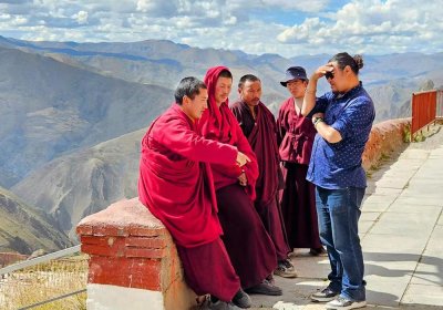 Traveler photo: Our guide was talking to the monks we met by chance. (April 2025)
