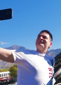 Traveler photo: Our beloved guests take selfie with the Potala Palace on the Chakpori hill, one of the best viewpoints to admire the most iconic landmark of Tibet. (April 2026)	