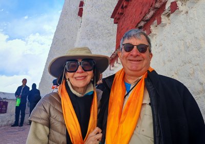 Traveler photo: Our beloved guests take pictures during their journey of climbing the Potala Palace, with the golden hada presented as a gesture of welcome. (April 2026)	