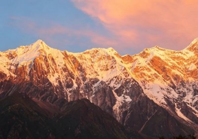 Traveler photo: The setting sun casts a golden glow across Mount Namcha Barwa. (August 2026)