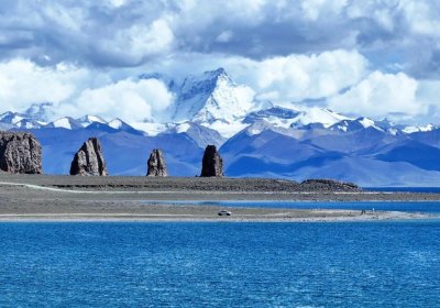 Traveler photo: Set against the turquoise waters of Namtso Lake, the Three Life Stones stand as silent guardians of Tibetan spiritual tradition. (August 2025)