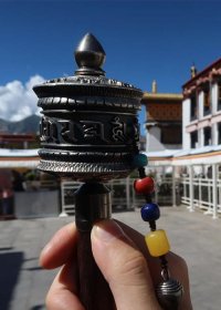 Traveler photo: Candid moments of pilgrims circling reveal Lhasa's living meditation. (August 2025)
