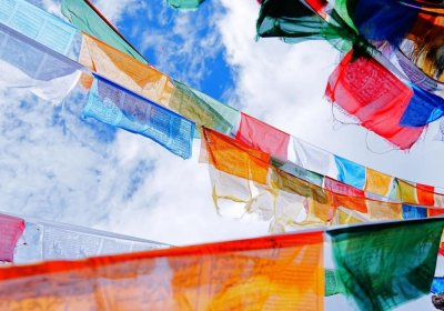 Traveler photo: On the way from Lhasa to Everest Base Camp, you’ll have plenty of opportunities to hang prayer flags at high mountain passes. (August 2025)
