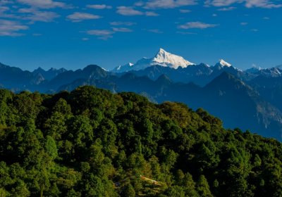 Traveler photo: In summer, Tibet's blue skies, snow mountains, and dense forests create a landscape of vivid contrast. (August 2026)