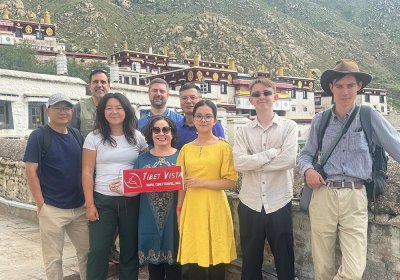 Traveler photo: Before Tashilhunpo Monastery, travelers' smiles shine with the essence of Tibetan Buddhist culture. (August 2025)