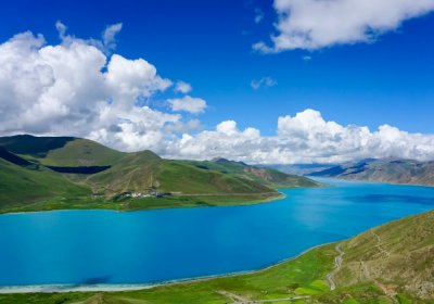 Traveler photo: In summer, Yamdrok Lake glows a vivid blue, its winding shoreline offering one of Tibet's most refreshing views. (August 2026)
