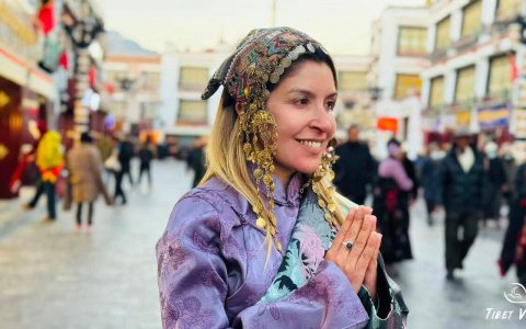 Traveler photo: In the ancient alleys of Barkhor Street in Lhasa, Tibet, our guest in traditional Tibetan attire is taking commemorative photos. (December 2025)
