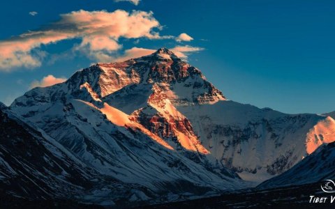 Traveler photo: Sunset casts a golden glow over the summit of Mount Everest. (December 2025)	