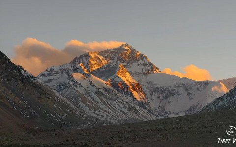 Traveler photo: At dusk in Everest Base Camp, Tibet, banner clouds on the world's summit resemble burning flags in golden afterglow. (December 2025)