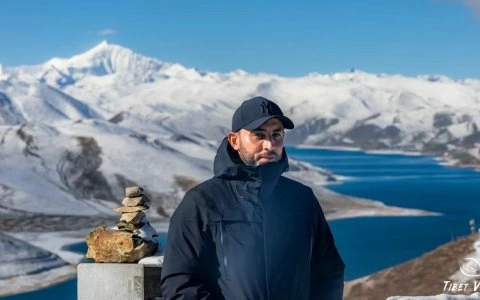 Traveler photo: Yamdrok Lake after snowfall with icy turquoise water. (February 2025)
