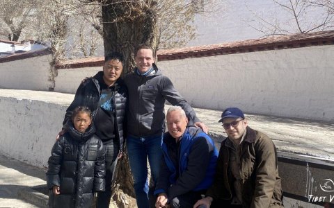 Traveler photo: In ancient alleys of Lhasa, guests surrounded by enthusiastic locals together leave cross-cultural images filled with smiles. (January 2026)