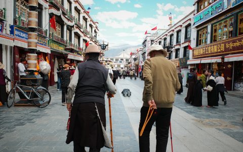 Traveler photo: Local Tibetan pilgrims kora around the Barkhor street. (July 2026)	