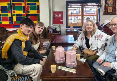 Traveler photo: Guests sip hot tea in a Lhasa teahouse, sharing travel stories and falling into the local rhythm of life. (July 2026)