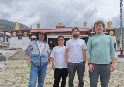 Traveler photo: After the tour, guests gather for a photo at the temple, preserving a peaceful and enriching cultural moment. (July 2026)