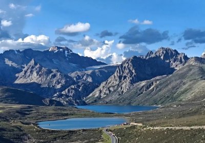 Traveler photo: Mountains and rivers are Tibet's classic duo—towering peaks and clear waters, beautiful in every season. (July 2026)