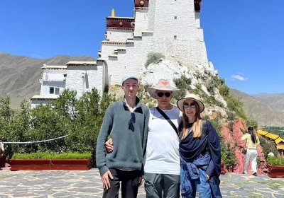 Traveler photo: Our tender moment, captured under the gaze of the sacred Potala Palace. (July 2025)