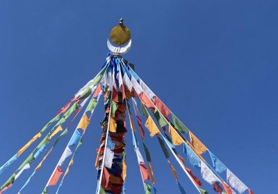 Traveler photo: Hanging prayer flags is a Tibetan way to pray for blessings - you’ll see many chances to do this between Lhasa and Shigatse. (July 2025)