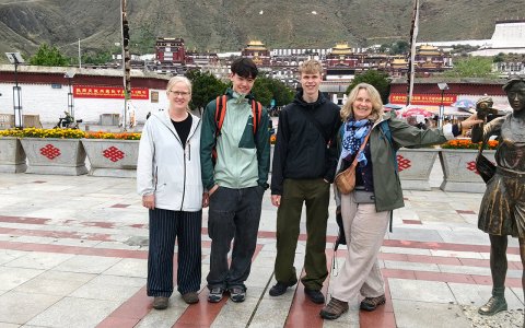 Traveler photo: Group photo in front of Tashilunpo monastery, the largest monastery in Shigatse. (July 2026)	